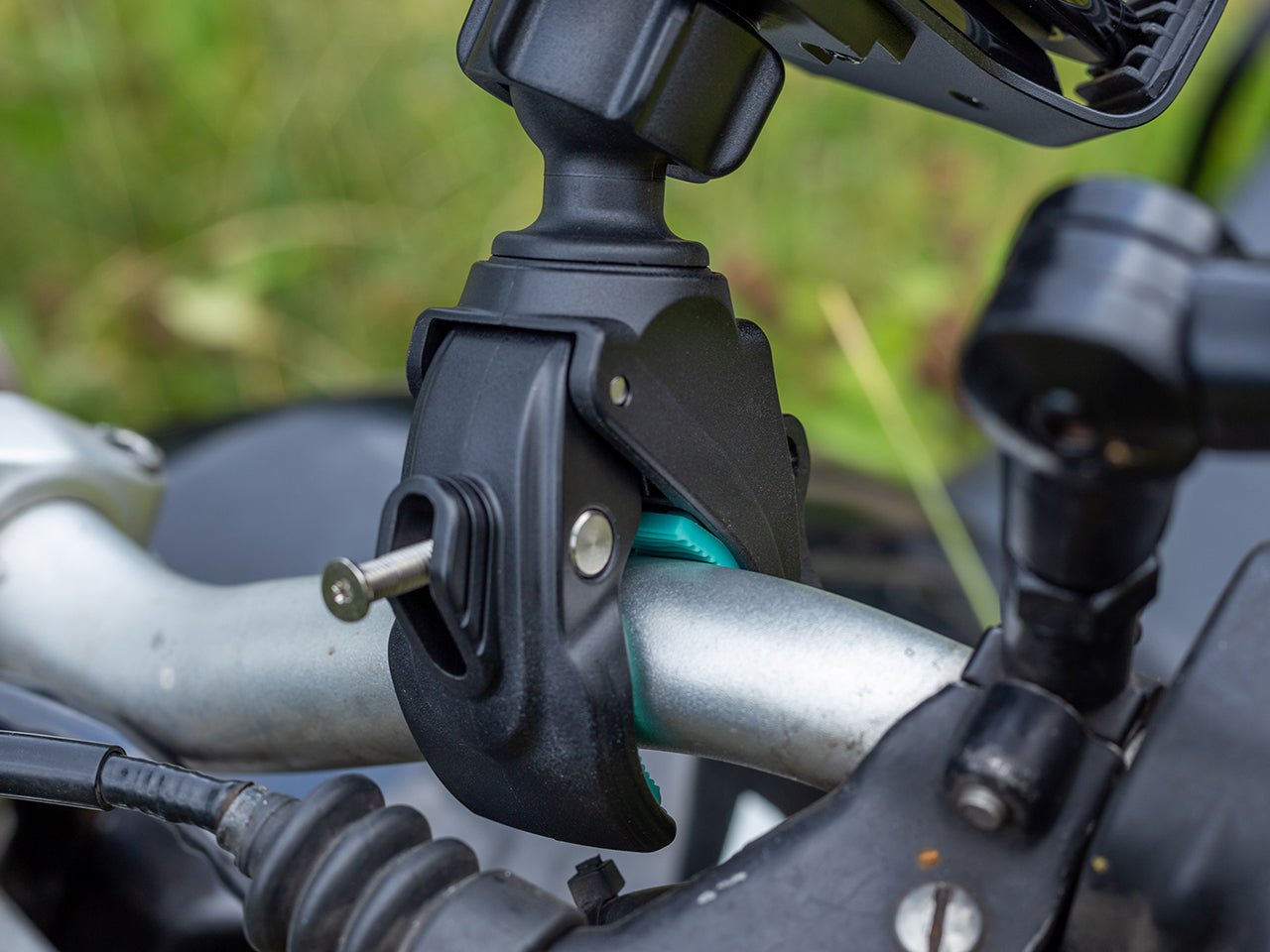 Holder with 3 Prong Adapter Gripper Mount Handlebar attached